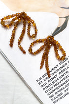 Boucles d'oreilles à nœud perlé Flora Tan