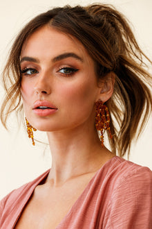 Boucles d'oreilles à nœud perlé Flora Tan