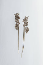 Boucles d'oreilles pendantes en forme de feuilles en zircon argenté