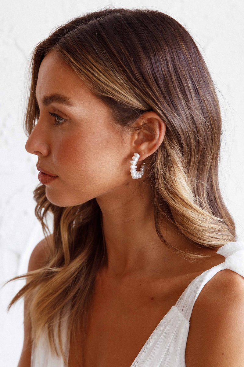 Boucles d'oreilles créoles en perles dorées