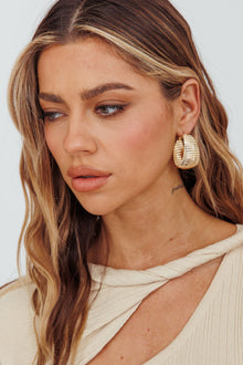 Boucles d'oreilles créoles ribbed Laureen en or