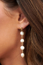 Boucles d'oreilles Maude en chaîne avec perles dorées