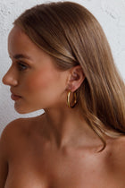 Boucles d'oreilles créoles Méduse Or