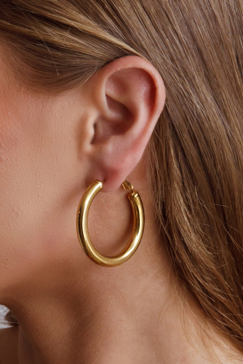 Boucles d'oreilles créoles Méduse Or