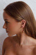 Boucles d'oreilles créoles Méduse Or