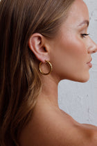 Boucles d'oreilles créoles Merrill en or