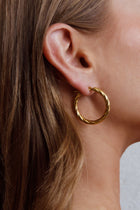 Boucles d'oreilles créoles Merrill en or