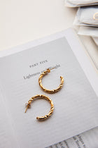 Boucles d'oreilles créoles ouvertes Rachmaninov en or