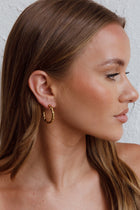 Boucles d'oreilles créoles ouvertes Rachmaninov en or