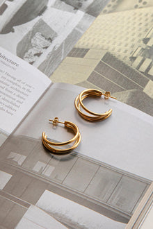 Boucles d'oreilles ouvertes triple Dominique en or