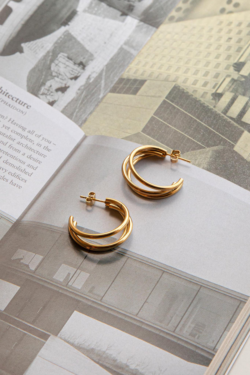 Boucles d'oreilles ouvertes triple Dominique en or