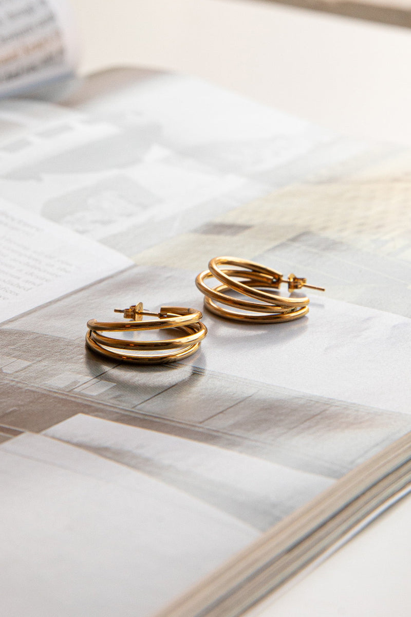 Boucles d'oreilles ouvertes triple Dominique en or