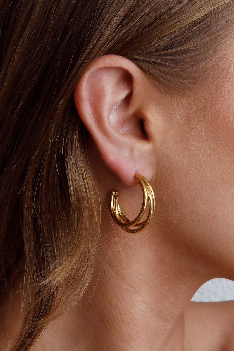 Boucles d'oreilles ouvertes triple Dominique en or