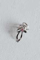 Bracelet d'oreille en strass avec nœud argenté