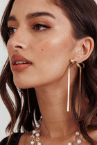 Boucles d'oreilles en or avec nœud en chevrons Macy