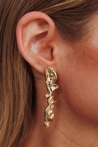 Boucles d'oreilles pendantes Bella en or