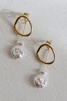 Boucles d'oreilles pendantes Amelie en perles dorées