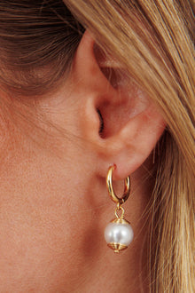 Boucles d'oreilles goutte en perles d'ébène dorées