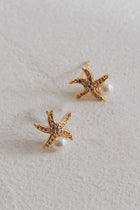 Boucles d'oreilles Étoile de Mer Éthérée avec Perle en Stud Or