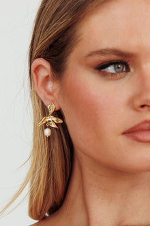 Boucles d'oreilles Lucie en forme de fleur avec perle en or