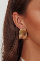 Boucles d'oreilles géométriques à stries Parker Or