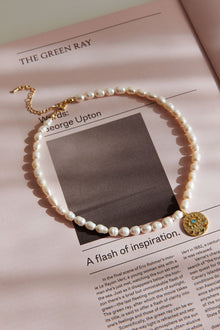 Collier en perles d'eau douce Œil Malin Or