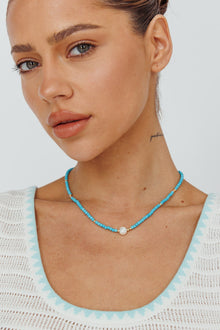 Collier en perles turquoise d'Ibiza en or